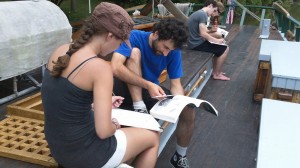 Jonathan Studying with a Volunteer