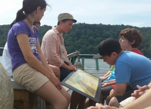 Samantha Perry with students onboard the sloop