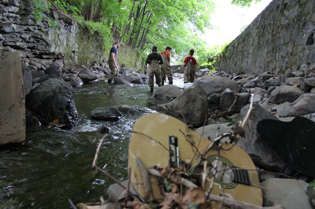 Aaron Knochel and Carolyn Klocker, Environmental Resource Educator, Cornell Cooperative Extension conducting macro-invertebrate study on the Fall Kill River with students.