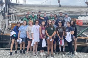 Group photo of the 2022 Young Women at the Helm participants and the Clearwater crew